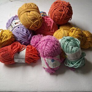 12 Bulky Yarns - priced to sell firm- yellow orange violets pinks..